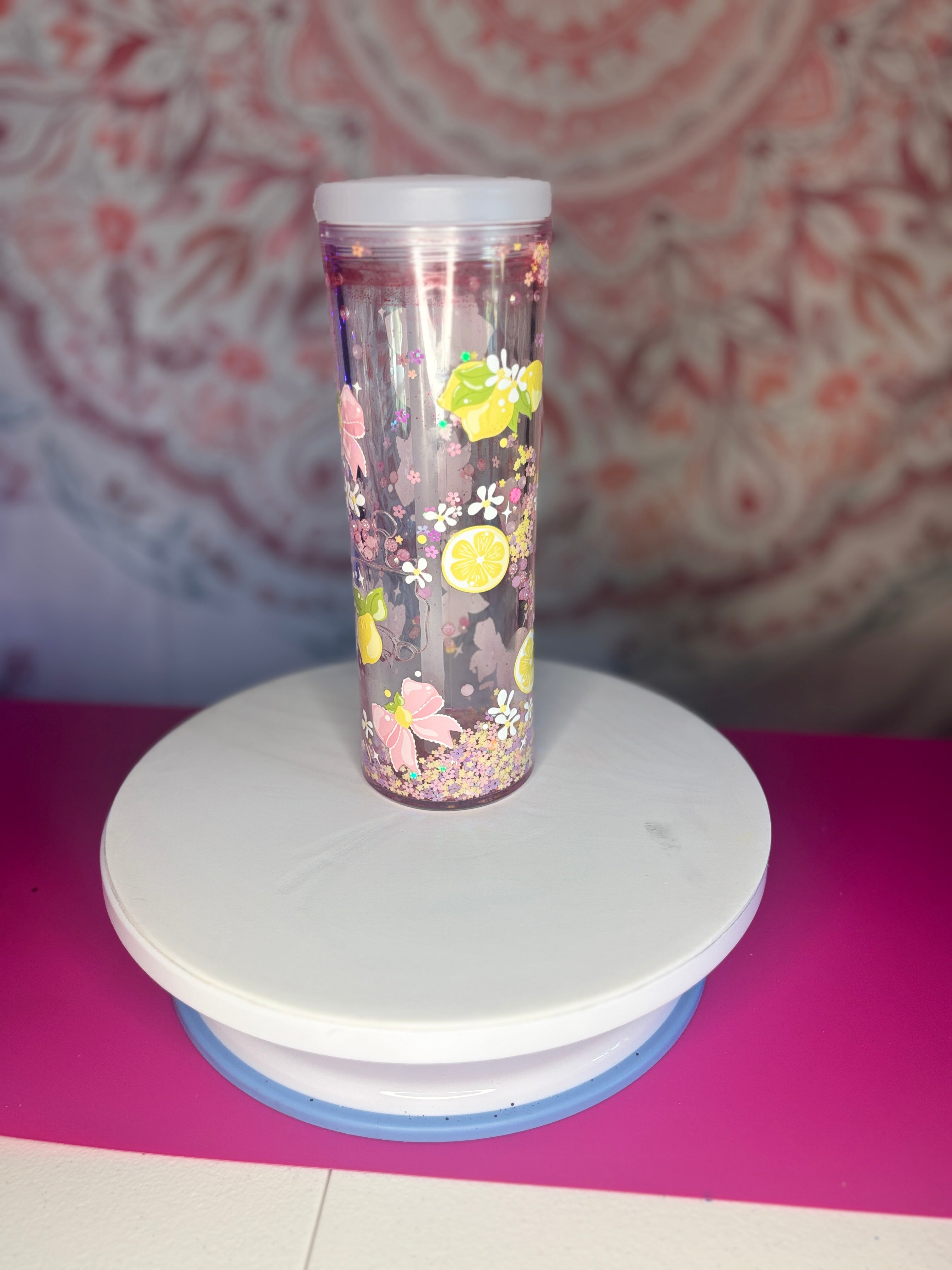 Pink bow and lemon flip top sports cup